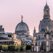 pink sky behind buildings in dresden