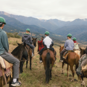Students riding horses in the mountains in Argentina