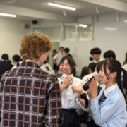 Students interacting with Japanese peers