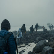 Students trek a snowy mountain in Iceland
